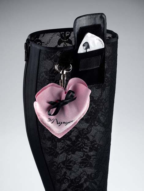A seductive lace bedroom boot features a condom pocket