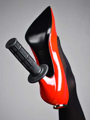 High heel shoe with cycle handgrip